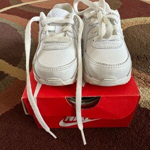 Children’s white Nikes size 4
